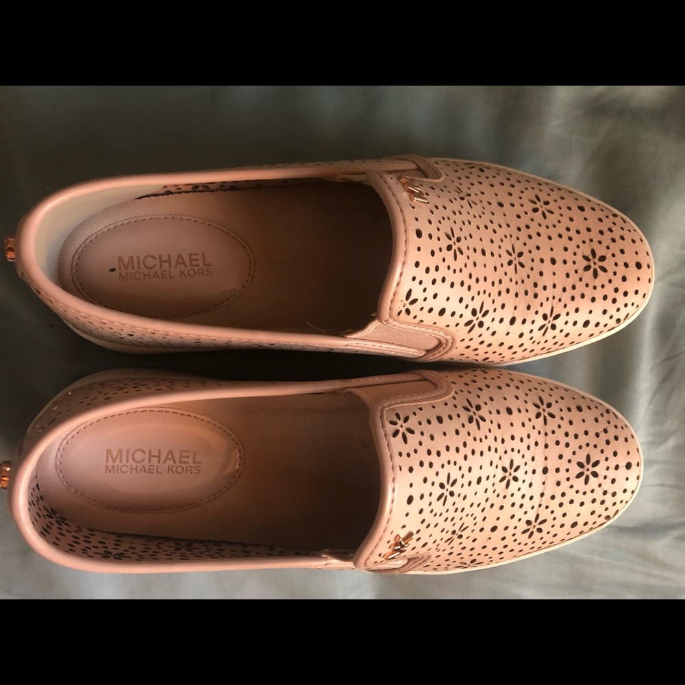 Michael Kors women slip on Lasered Sneakers, soft pink 7.5